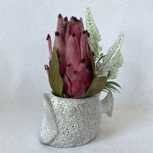 Decorative Fish-Shaped Vase with Pink and Green Floral Arrangement